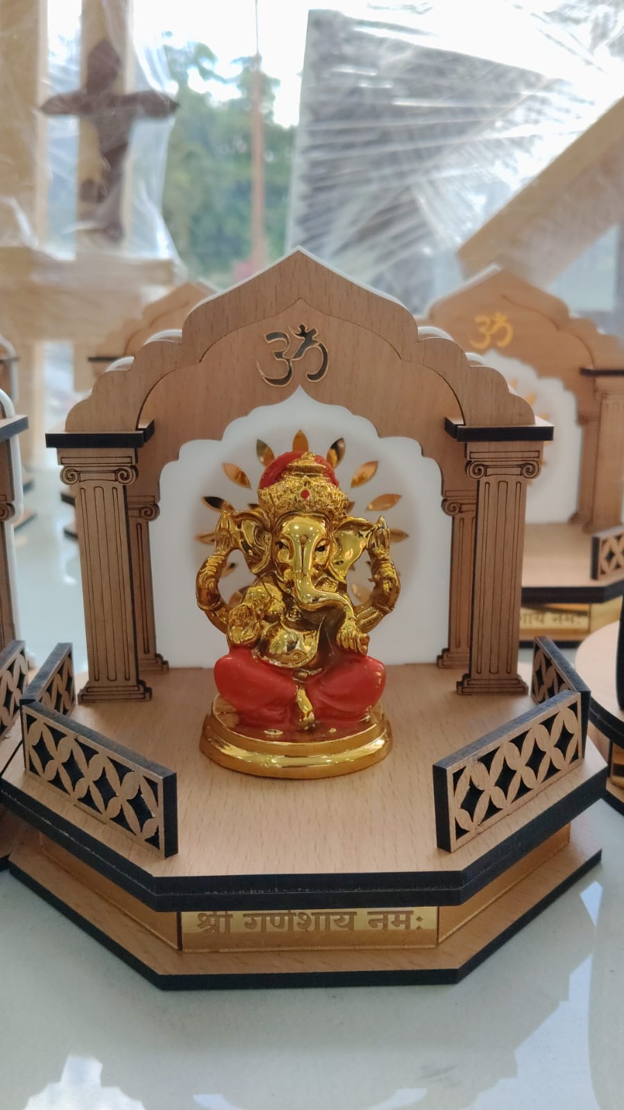 Gold Ganesha acrylic car dash temple with wooden arch — Aryaveil India